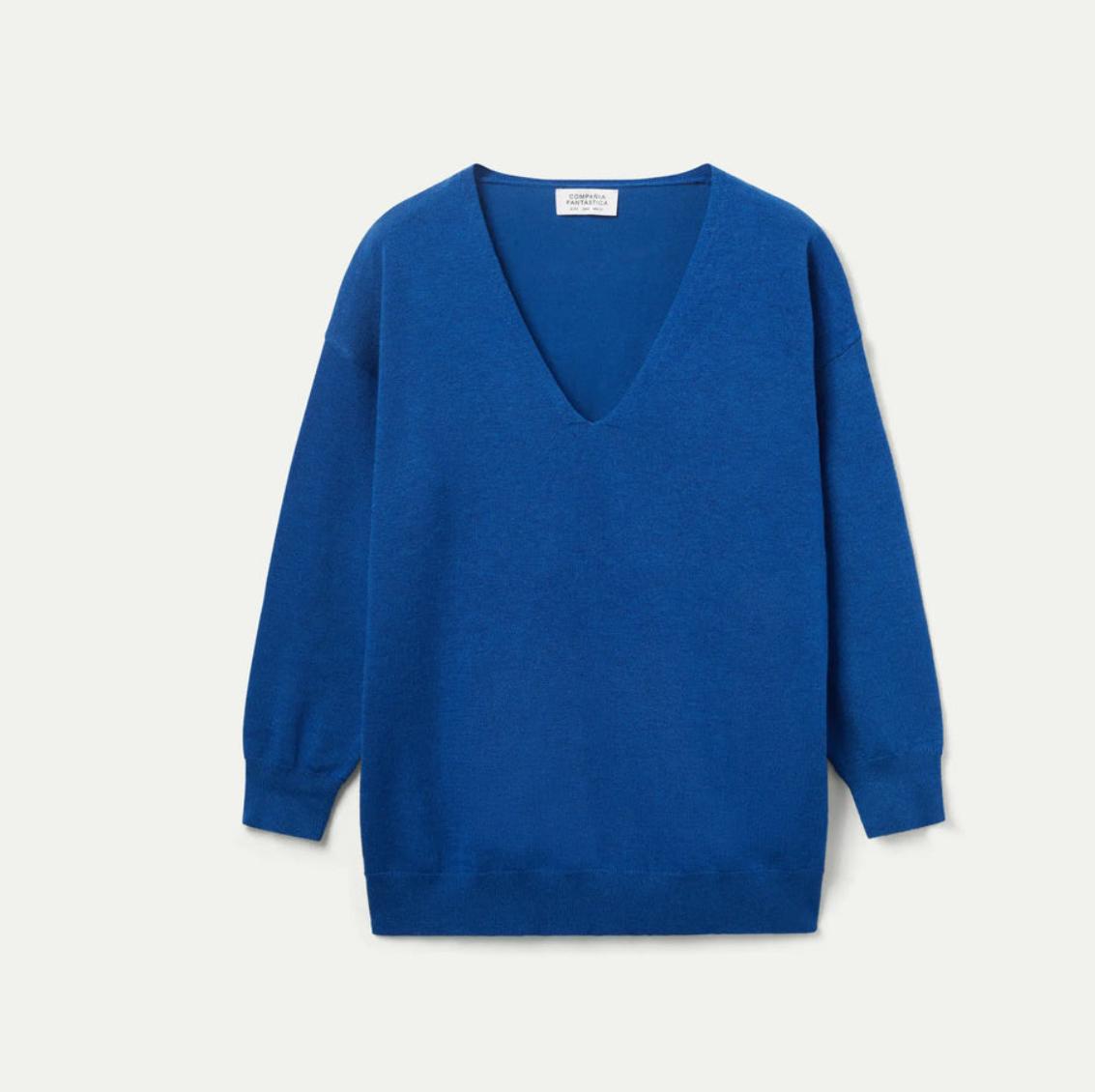 Maglione blu con scollo a V